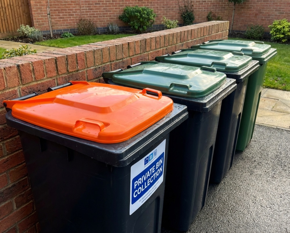 Recycling and general waste bins on a Aldwick street